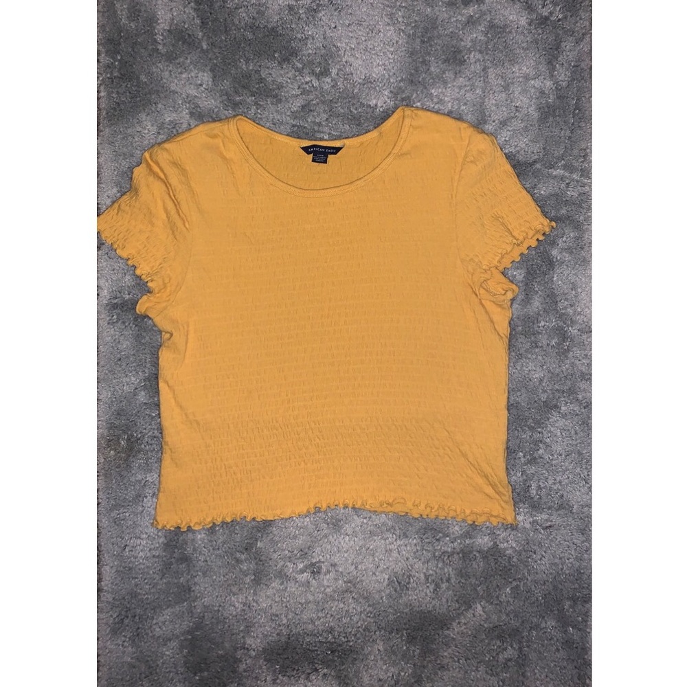 Ribbed lettuce edge yellow crop top.